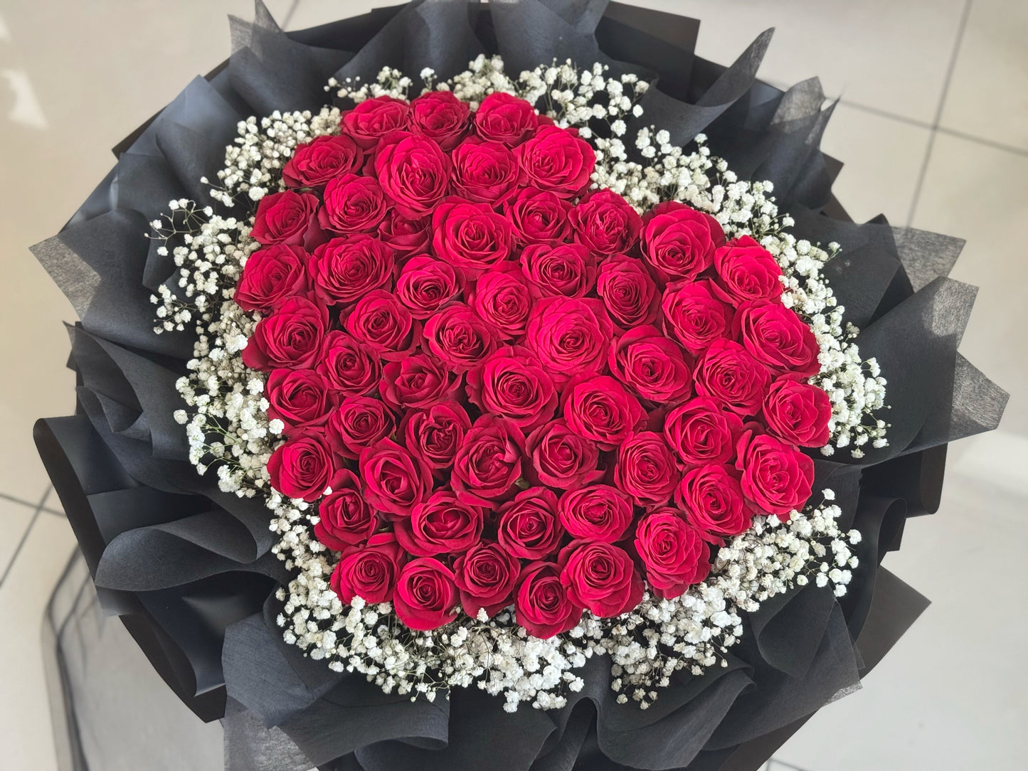 52 Red rose with baby breath